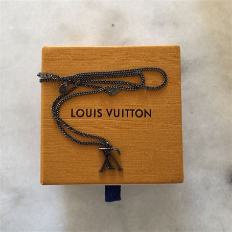 louis vuitton upside down necklace replica|Louis Vuitton wallet false.